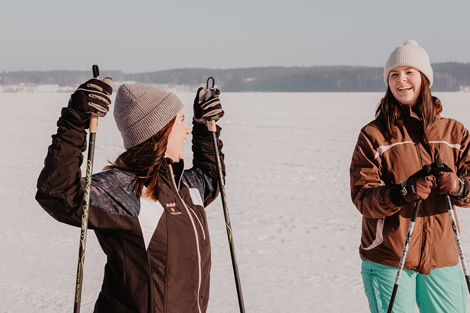 Image of two young women in an winter setting.