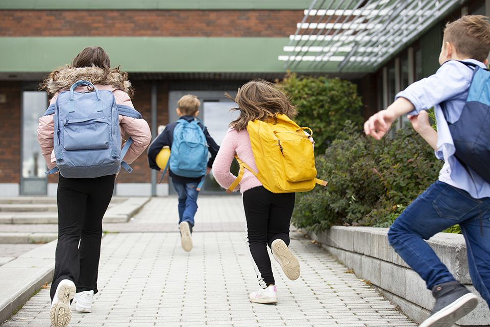 Kids running to school