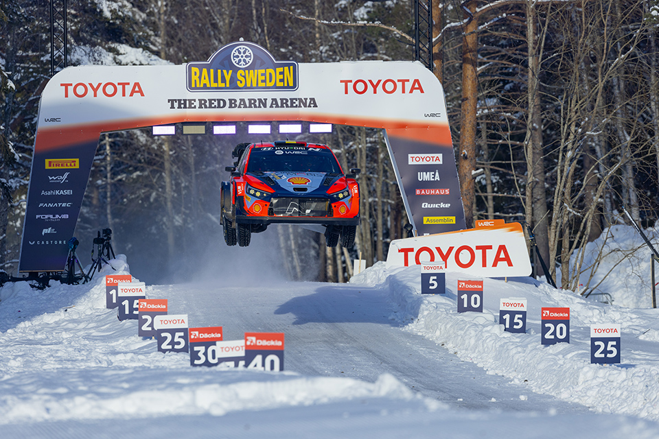 Rally car in a jump at Red Barn Arena, Umeå.